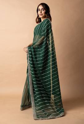 Women's pink striped leheriya print embroidered lace border georgette saree with unstiched blouse piece 3