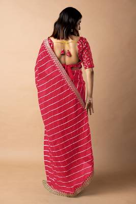 Women's red striped leheriya print embroidered lace border georgette saree with unstiched blouse piece 4