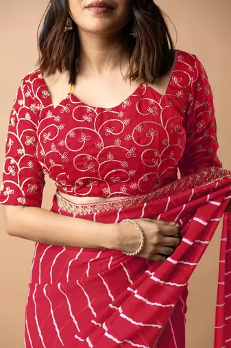 Women's red striped leheriya print embroidered lace border georgette saree with unstiched blouse piece