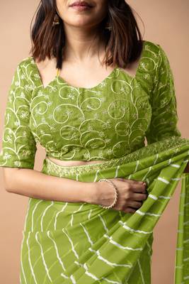 Women's parrot green striped leheriya print embroidered lace border georgette saree with unstiched blouse piece 5