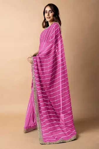 Women's pink striped leheriya print embroidered lace border georgette saree with unstiched blouse piece