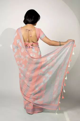 Women's peach floral print silver zari border cotton blend saree with unstiched blouse piece