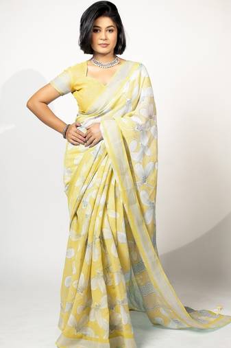Women's pastel yellow floral print silver zari border cotton blend saree with unstiched blouse piece