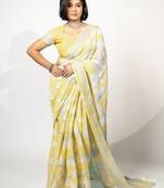Women's pastel yellow floral print silver zari border cotton blend saree with unstiched blouse piece