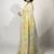 Women's pastel yellow floral print silver zari border cotton blend saree with unstiched blouse piece