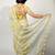 Women's pastel yellow floral print silver zari border cotton blend saree with unstiched blouse piece