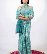 Women's turquoise floral print golden zari border cotton blend saree with unstiched blouse piece
