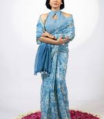 Women's blue floral print golden zari border cotton blend saree with unstiched blouse piece