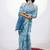 Women's blue floral print golden zari border cotton blend saree with unstiched blouse piece