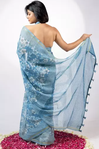 Women's blue floral print golden zari border cotton blend saree with unstiched blouse piece