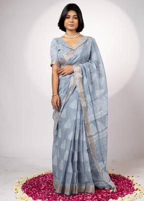 Women's greyish blue block print golden zari woven cotton blend saree with unstiched blouse piece 1
