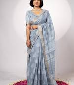 Women's greyish blue block print golden zari woven cotton blend saree with unstiched blouse piece