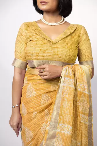 Women's yellow block print golden zari woven cotton blend saree with unstiched blouse piece