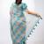 Women's beige floral print golden zari woven cotton blend saree with unstiched blouse piece