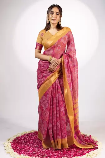 Women's rani pink ajrakh print golden zari woven cotton blend saree with unstiched blouse piece