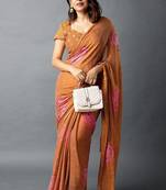 Women's rust foil bandhani print golden lace border chiffon saree with unstiched blouse piece