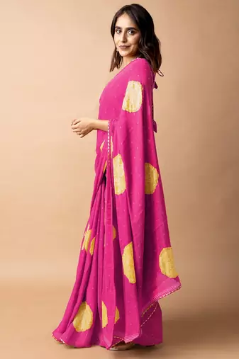 Women's bright pink foil bandhani print golden lace border chiffon saree with unstiched blouse piece