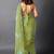 Women's olive green foil bandhani print golden lace border chiffon saree with unstiched blouse piece