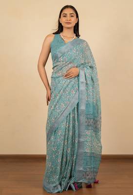 Women's turquoise floral print silver zari border cotton blend saree with unstiched blouse piece 1