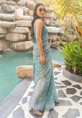 Women's turquoise floral print silver zari border cotton blend saree with unstiched blouse piece 3