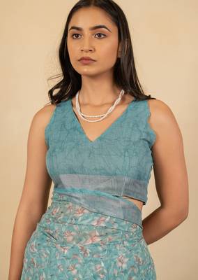 Women's turquoise floral print silver zari border cotton blend saree with unstiched blouse piece 5