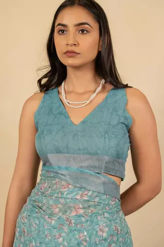 Women's turquoise floral print silver zari border cotton blend saree with unstiched blouse piece