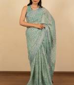 Women's green floral print silver zari border cotton blend saree with unstiched blouse piece