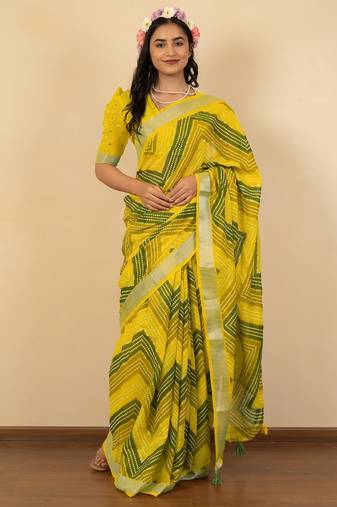 Women's yellow foil print silver zari border cotton blend saree with unstiched blouse piece