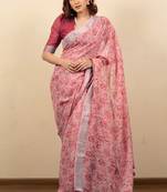 Women's coral pink floral print silver zari border cotton silk saree with unstiched blouse piece