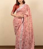 Women's peach floral print silver zari border cotton silk saree with unstiched blouse piece