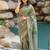 Women's olive green ikkat print silver zari border cotton silk saree with unstiched blouse piece