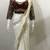Cream embroidery chinon lahariya saree with readymade embroidery stitched blouse