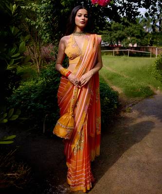 Orange printed georgette saree 4