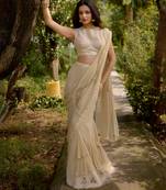 Cream embroidered georgette saree