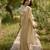 Cream embroidered georgette saree