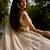 Cream embroidered georgette saree