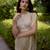 Cream embroidered georgette saree