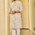 Cream golden schiffli chikan sequence work rayon kurta with cotton pajama