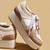 Beige solid leather wedges