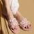 Pink embroidered satin flats