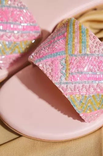 Pink embroidered satin flats