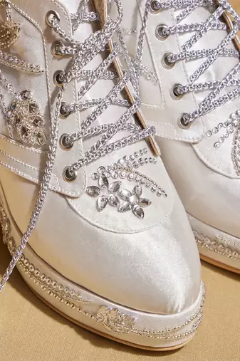 White embroidered satin heels