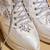 White embroidered satin heels