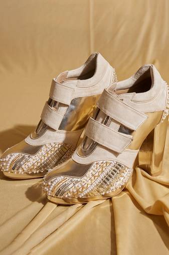 White embroidered leather heels