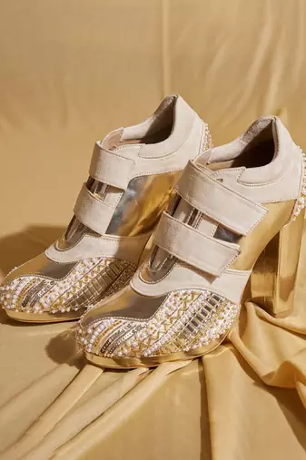 White embroidered leather heels