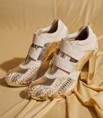 White embroidered leather heels