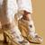 White embroidered leather heels