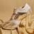 White embroidered leather heels
