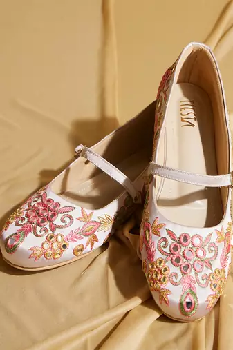 White embroidered satin ballerinas