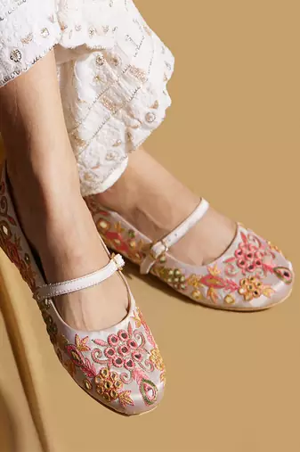 White embroidered satin ballerinas